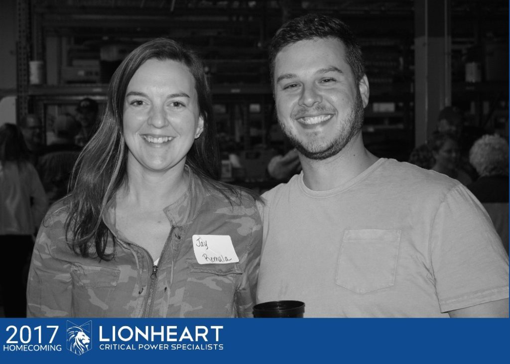 man and woman smiling at the camera during lionheart homecoming